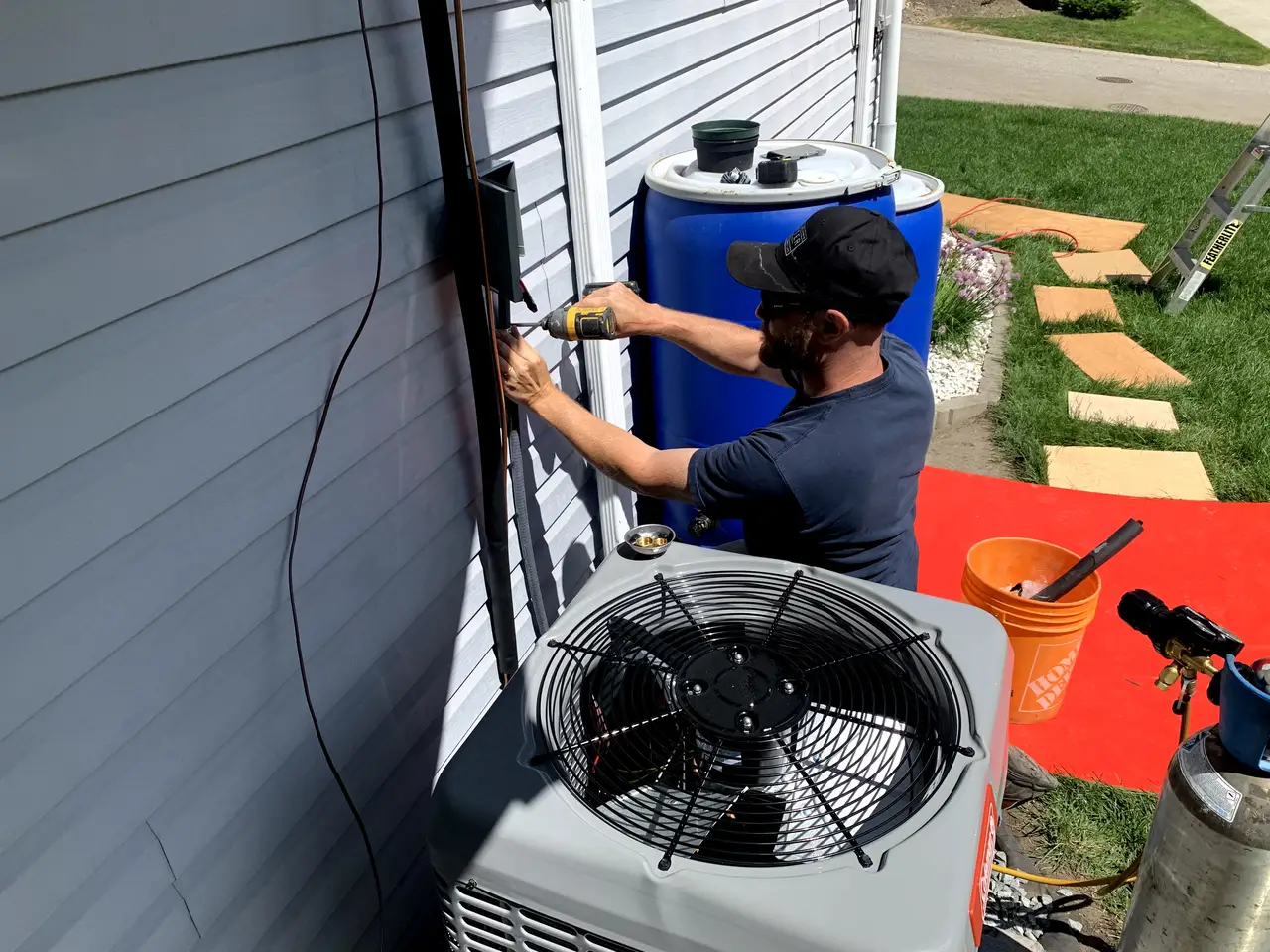Outdoor central AC installation example; not a local service visit